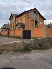 Два новых дома на одном участке в Харькове дешево